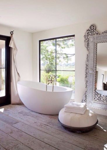 Egg shaped tub and a room with a view. Found on snobfashionsource.blogspot.com