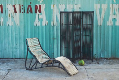 Lounging with all the nonchalance of paint peeling walls and a vision of summer haze. $129  Pricier than I'd like, but with the handmade aspect, I'll pay for it!