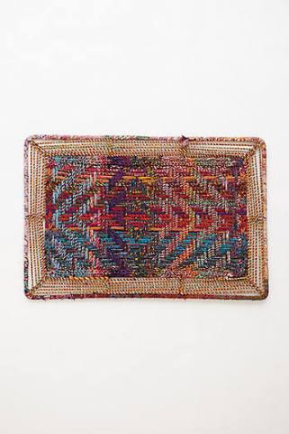 At $198, this ANthro woven door mat isn't something I'd wipe my feet on. But it sure is beautiful. 