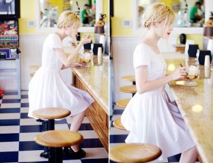 If it's a baby being showered, you can get away with this adorable bright white look. Braids and a bold lip complete the look. 