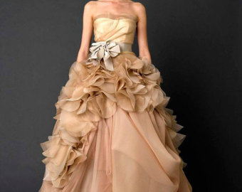 This dress has a very theatrical flare that reminds me of ballet costumes... and actually resembles quite closely the dress I ended up purchasing. Strapless tulle and organza princess wedding dress. Lemandywedding.