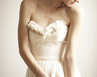 I fell in love with the delicate, fragility and texture of this ecru coloured gown. The flattering detail at the bust and the irregular hem was so reminiscent of a ballet costume that I almost caved and ordered it online. Alice- Silk Chiffon Wedding Gown $3,317.48 CAD Leanimal