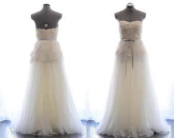 Seeing some similarities emerging: off-white, soft skirts and layers, sweetheart necks, bare shoulder(s) and back, waist details... Custom Wedding Gown- Summer Sunshine-Alencon lace and tulle A-line floor length wedding dress-made to order: $2,253.38 CAD TingBridal