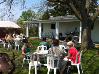 Enjoying the mood and music on the lawn of 13th Street.