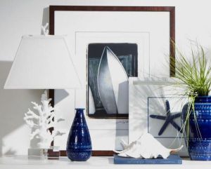 A vignette inspired by coral and sea side iconography. Found on nauticalcottageblog.com